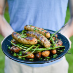 Grilled Sausage with Potatoes and Garlic Scapes
